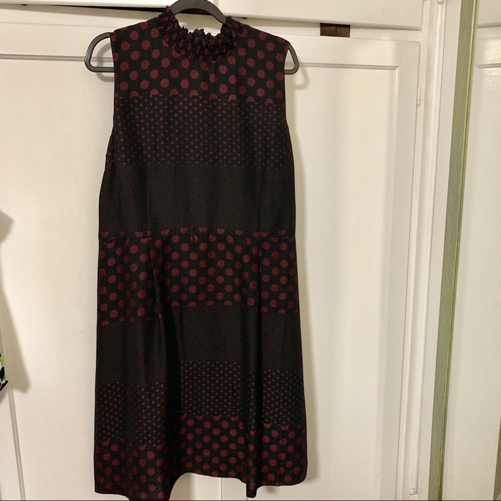 Sleeveless high collar dress